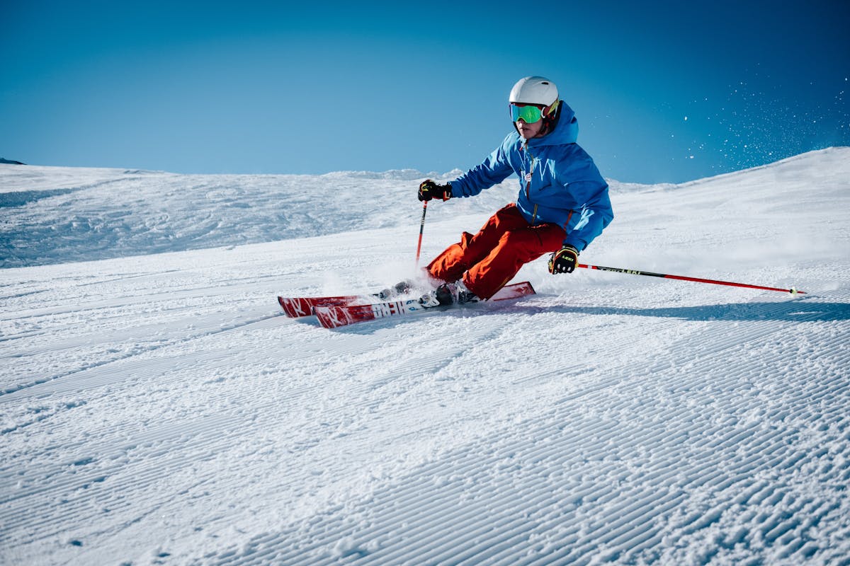Person skiing down mountain slope